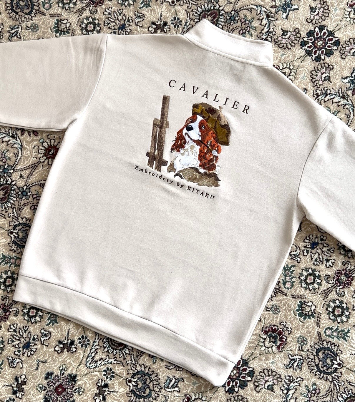 キャバリア画伯のハーフジップ